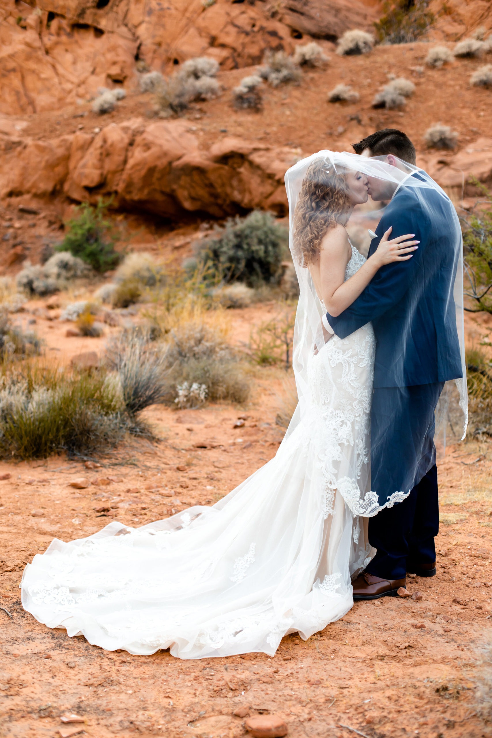 Valley of Fire Elopement | Las Vegas Elopement Photographer | Long Veil with Long Wedding Dress Train