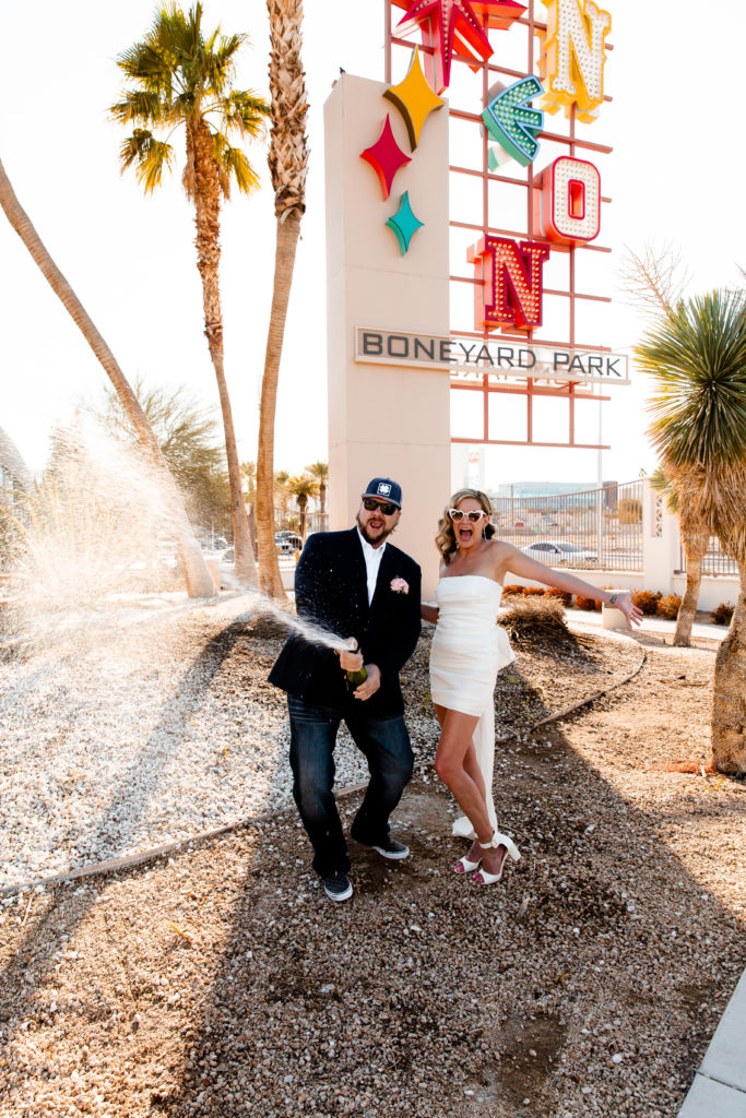 A champagne pop in Las Vegas at a Neon Museum Elopement