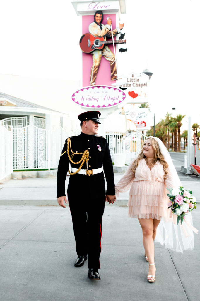 A bride and groom celebrating their elopement at the A Little White Chapel in Las Vegas