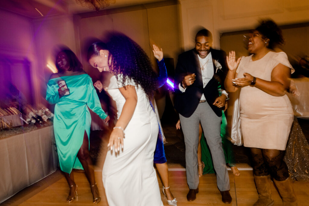 Bride dancing with friends during this Las Vegas wedding reception