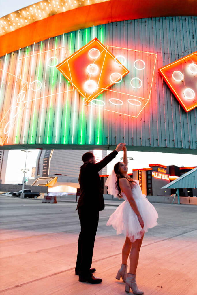 A couple dancing on a Vegas rooftop