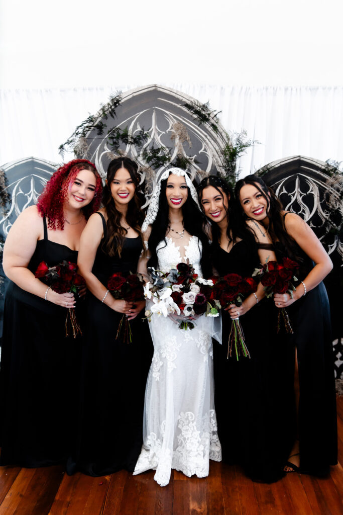 The bridesmaids gather together at the Sonic Temple, their dresses and smiles adding to the festive and joyful atmosphere.