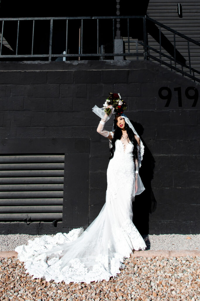 Las Vegas wedding photographer captures A stunning portrait of the bride at the Sonic Temple, showcasing her elegance and beauty against the venue's gothic backdrop.