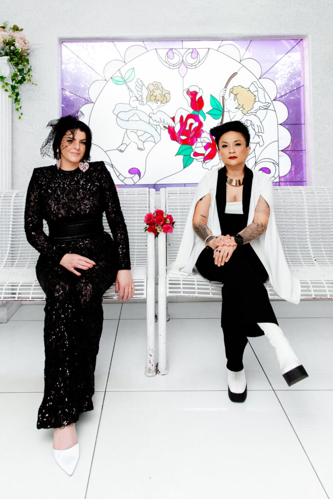 Las Vegas photographer captures The brides sit in the waiting room of A Little White Chapel, surrounded by beautiful stained glass windows, as they waits for the ceremony to begin.