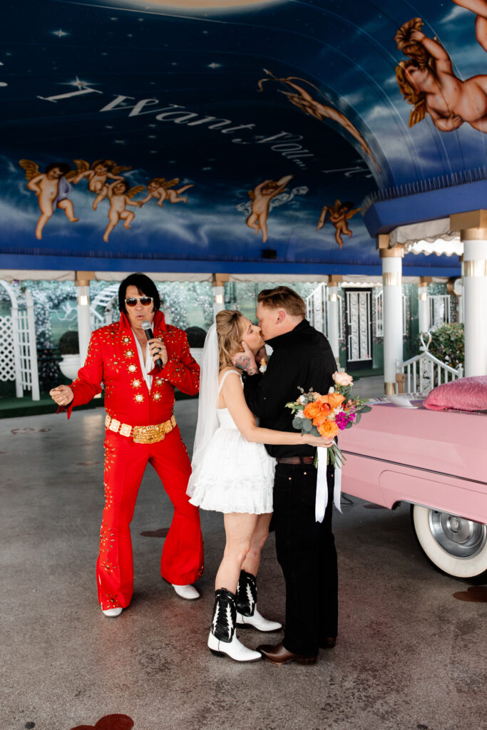 Bride and groom sharing first dance with Elvis at A Little White Chapel, Las Vegas