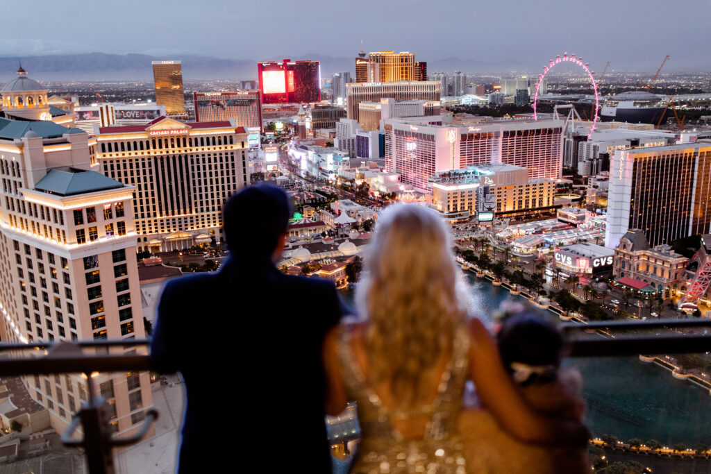 The stunning nighttime view from the Cosmopolitan suite balcony, showcasing the dazzling lights and iconic landmarks of the Las Vegas Strip.