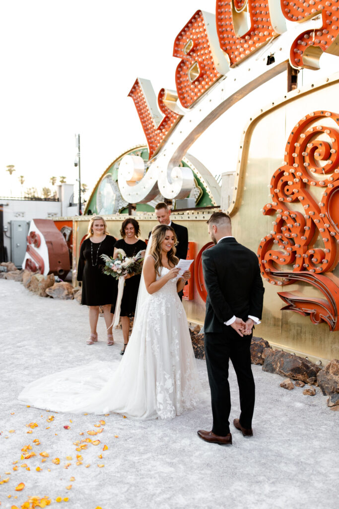 intimate wedding ceremony at Neon Museum