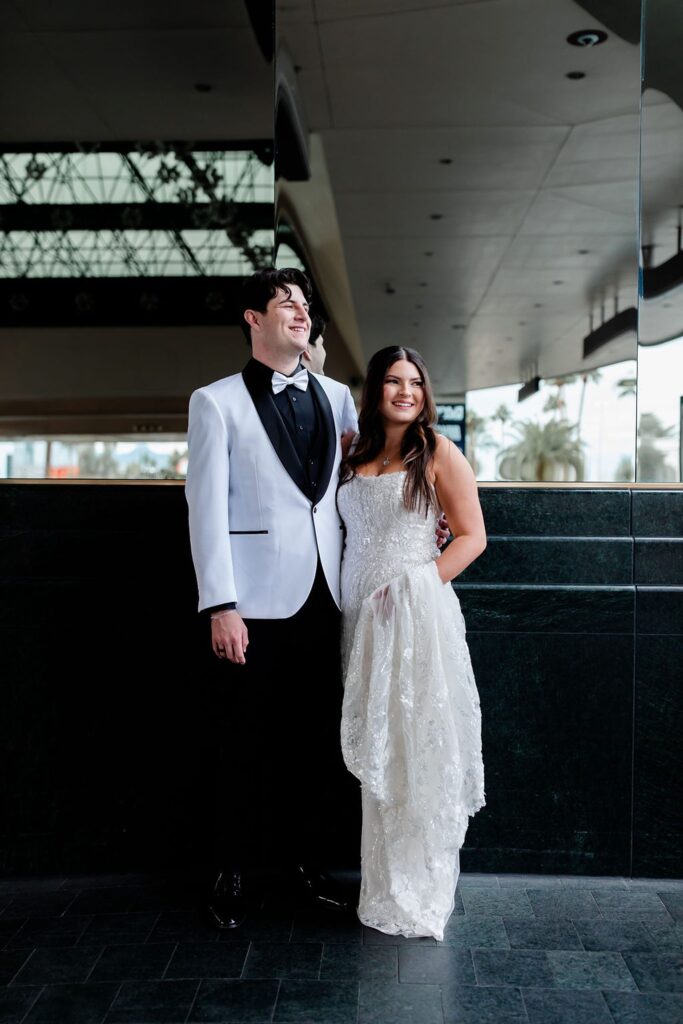 Bride and groom posing at MGM Las Vegas