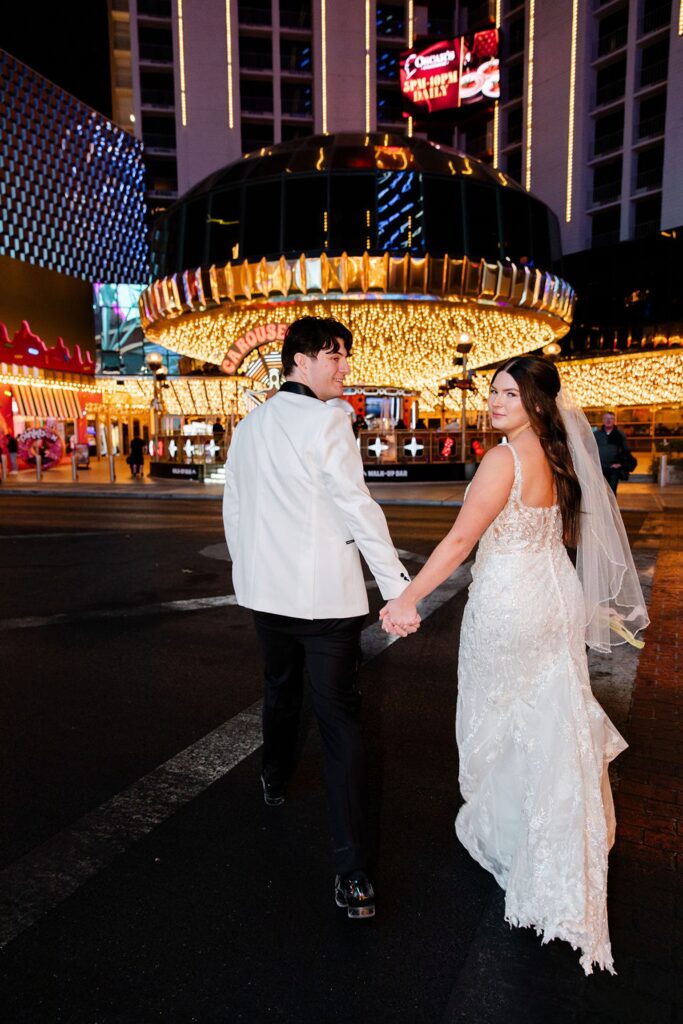 Bride and grooms Fremont Street wedding portraits