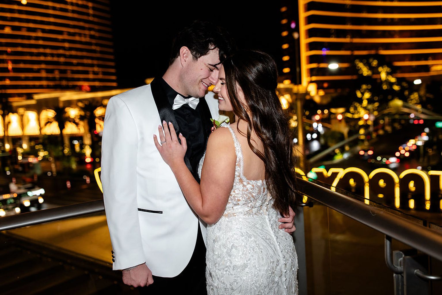 Bride and groom posing during their Indoor Las Vegas wedding reception at Maggiano's Little Italy