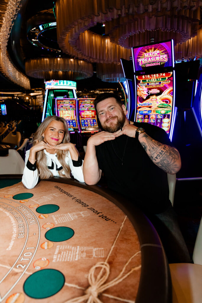 Podcast hosts of MaxBet Media posing for their branding photos at the casino