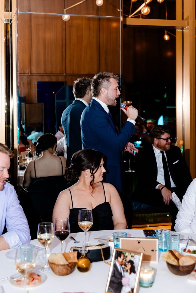 Man giving speech during Las Vegas wedding reception