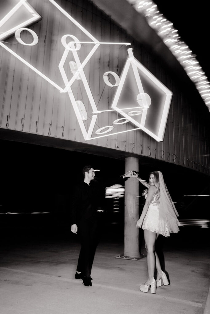 Black and white photo of a couple dancing on Binion's Rooftop in Las Vegas
