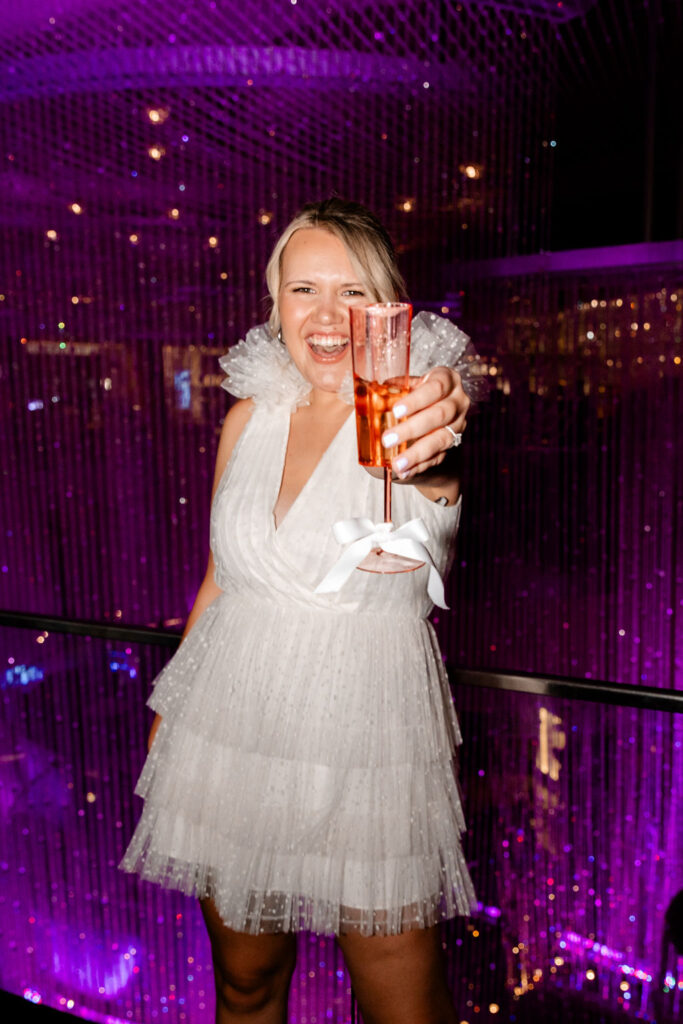 Bride posing for her Las Vegas bachelorette party photos at The Cosmopolitan 