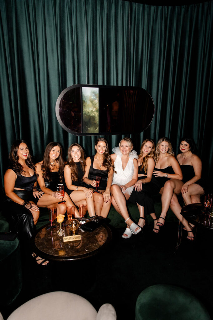 Bride and her girls posing at Easy's Cocktail Lounge for her Las Vegas bachelorette party photos