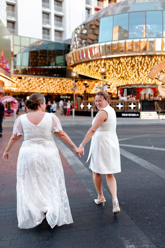 LGBTQ+ elopement photos in downtown Las Vegas on Fremont Street