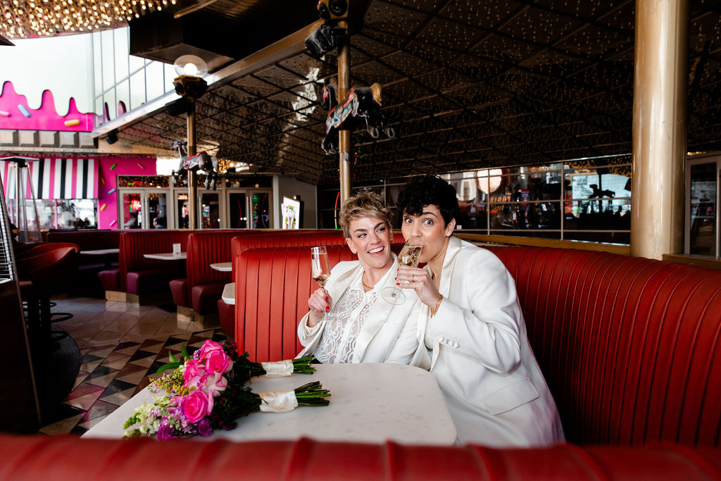 LGBTQ+ couple having drinks at Carousel Bar in downtown Las Vegas