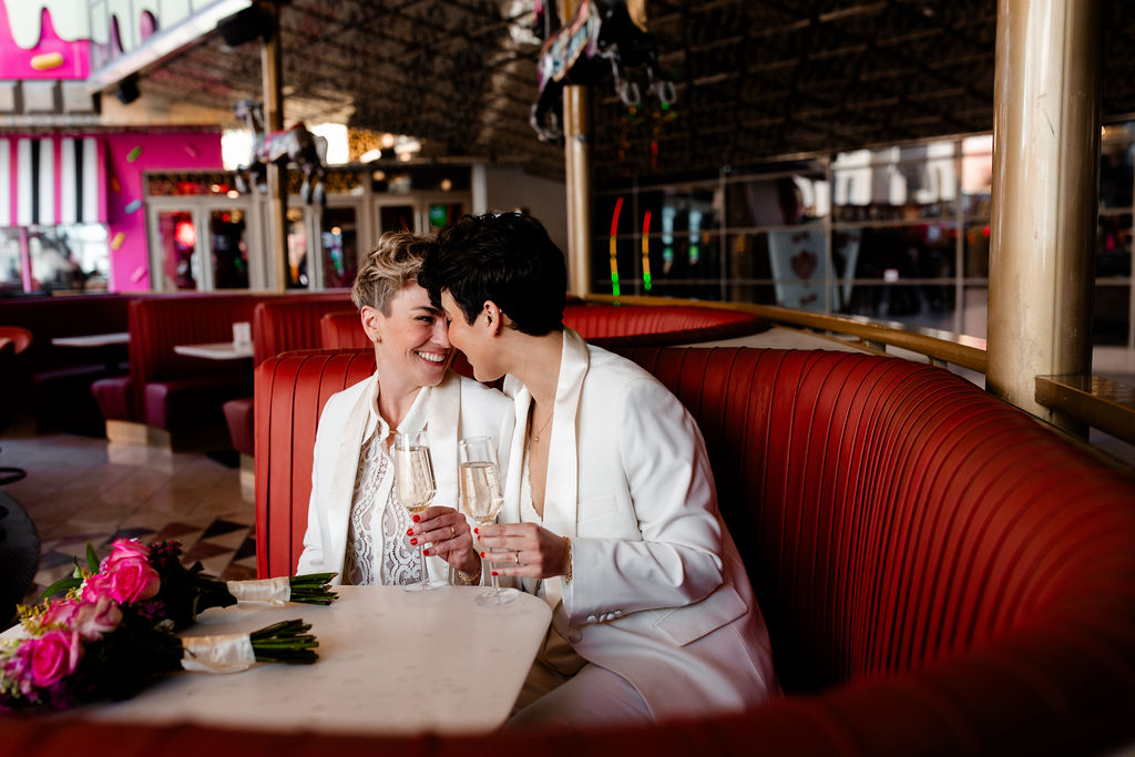 LGBTQ+ couple having drinks at Carousel Bar in downtown Las Vegas