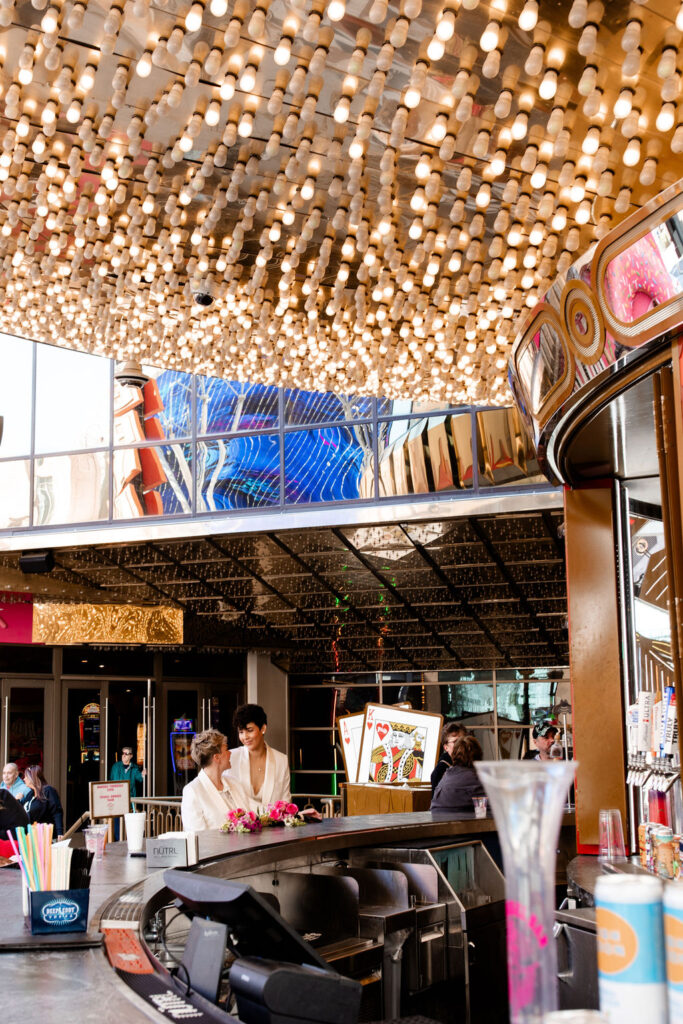 LGBTQ+ couple having drinks at Carousel Bar in downtown Las Vegas