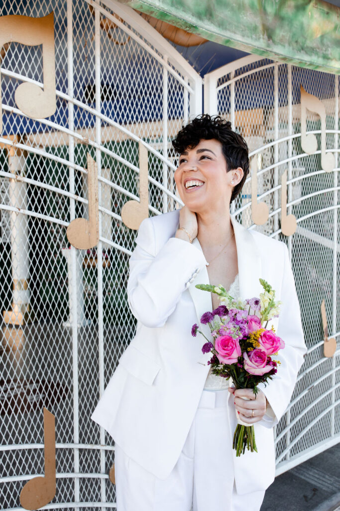 Bride wearing a suit for her Las Vegas elopement