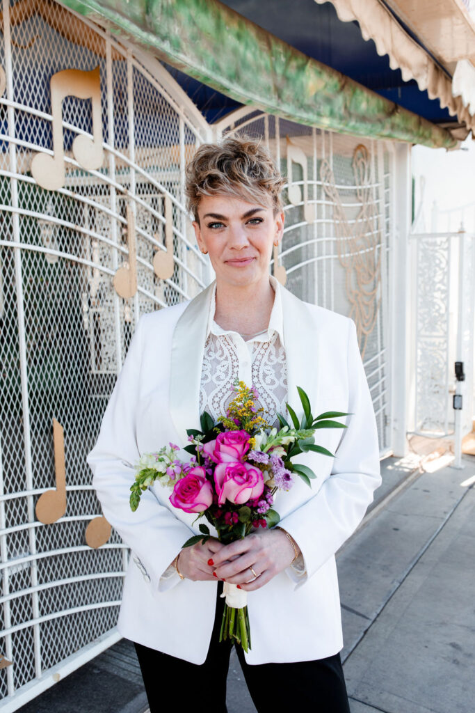 Bride wearing a suit for her Las Vegas elopement