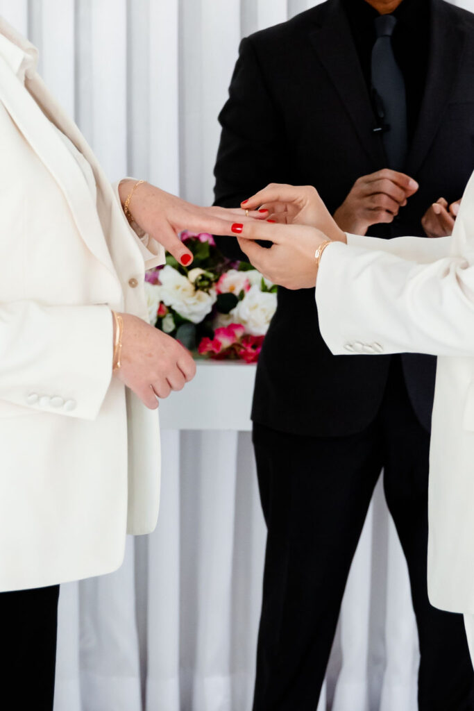 Couple exchanging rings