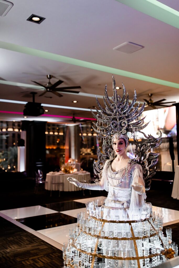 A champagne skirt hostess at The LOFT at Cabo Wabo