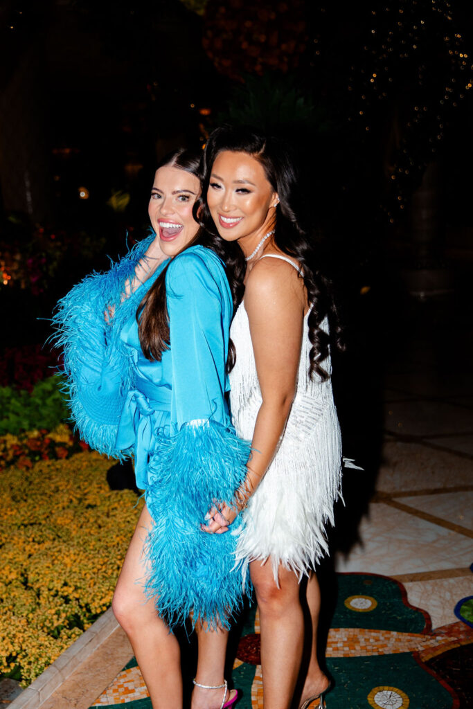 Bride posing with a friend for her Gatsby Glam Las Vegas bachelorette party