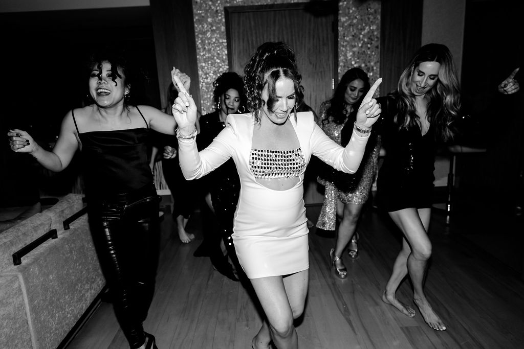 Bride dancing with her friends during her Last Disco Las Vegas bachelorette party