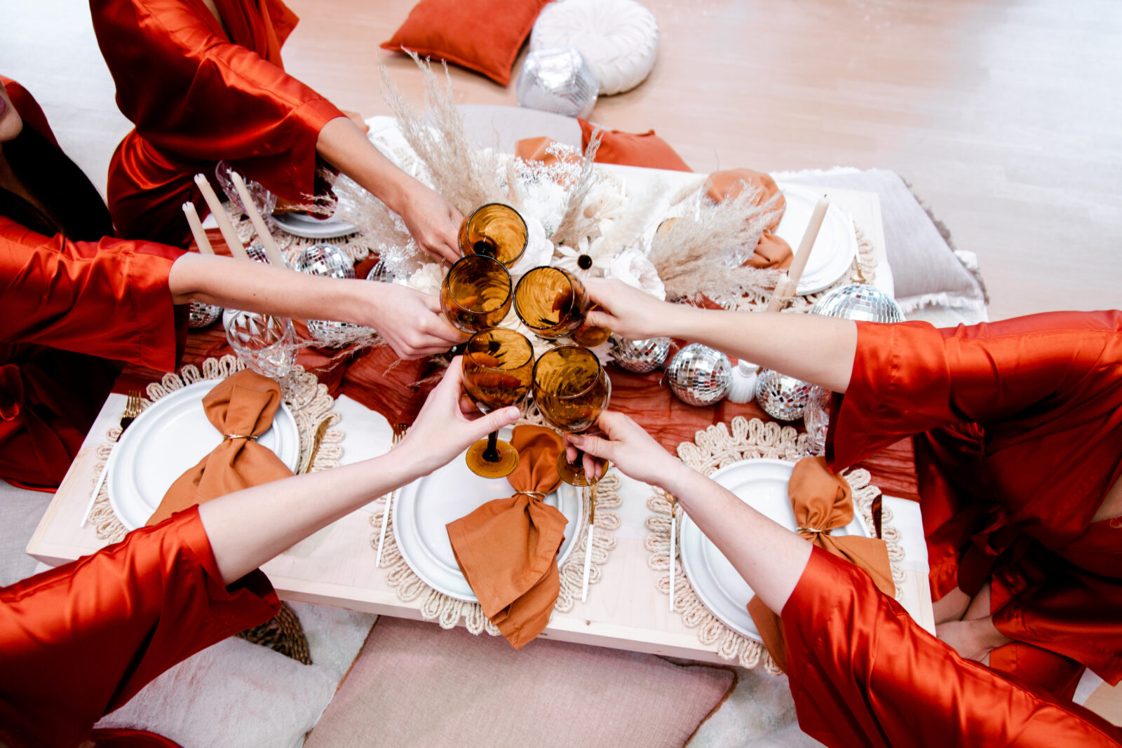 Bride-to-be and her friends toasting drinks for a spa bachelorette party in Las Vegas