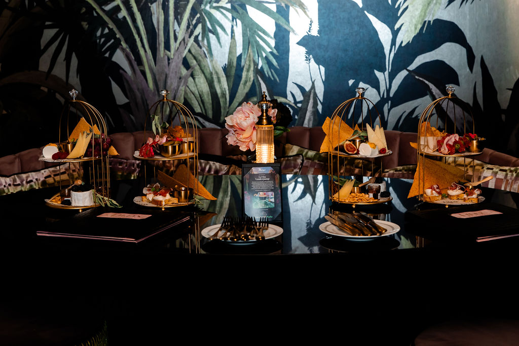 Pinky’s by Vanderpump reception table styled with charcuterie and signature details.