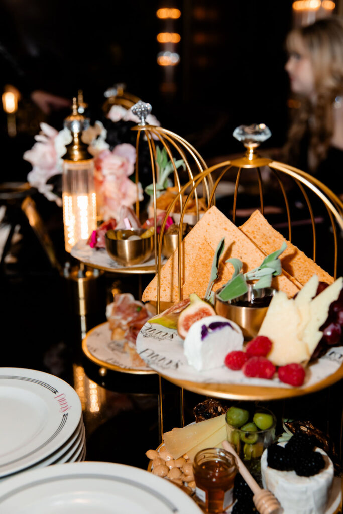 Elegant charcuterie spread on gold trays for a Las Vegas wedding reception at Pinky’s.
