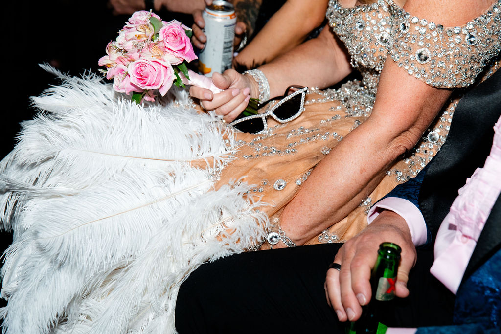 Close up photo of a couple having drinks on their party bus in Las Vegas