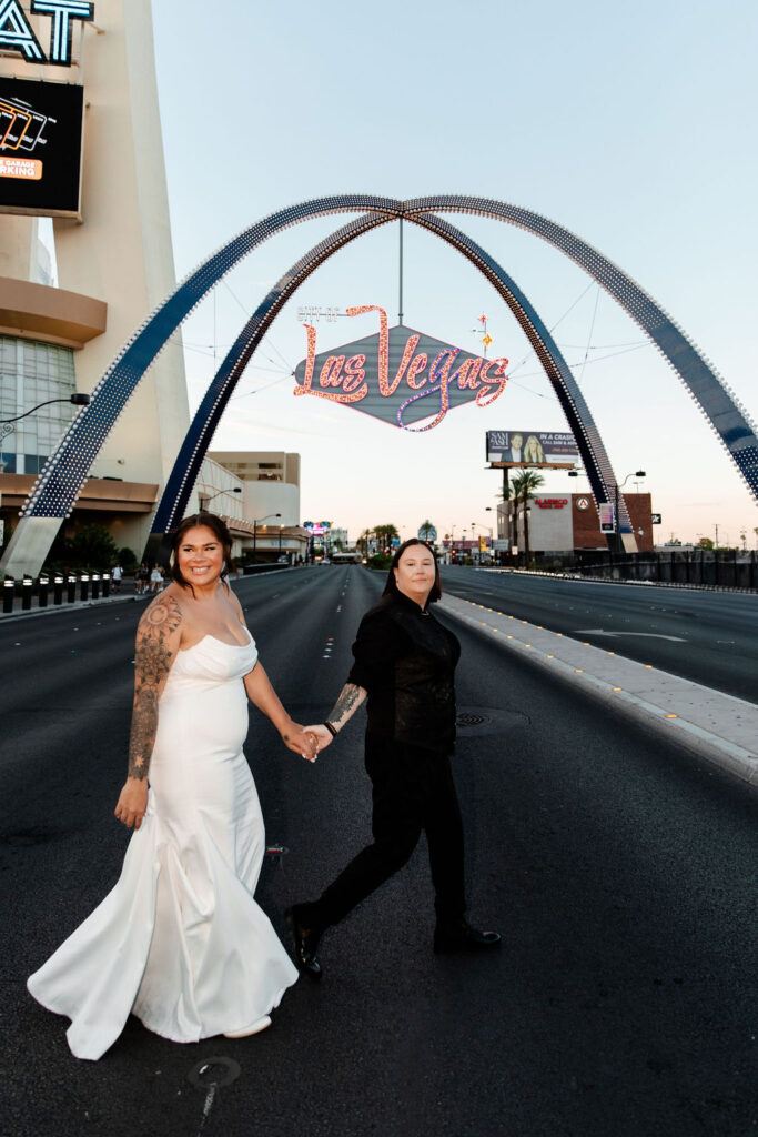 Couple crossing the street for their Las Vegas elopement photos