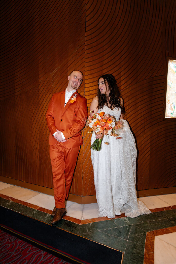 Bride andgroom posing in Bellagio for their Las Vegas micro wedding photos