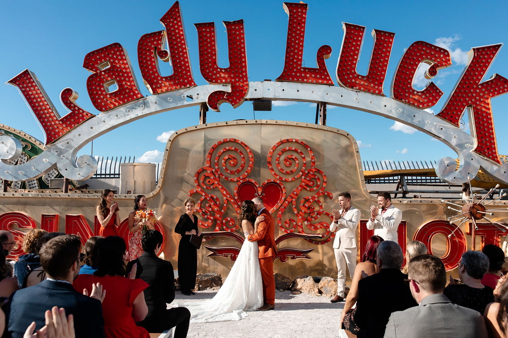 Bride and groom kissing during their Neon Museum Las Vegas micro wedding