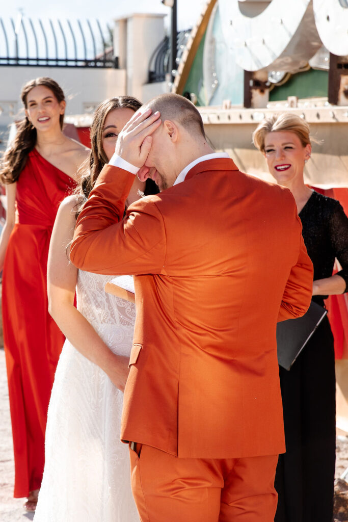 Groom getting emotional during his Neon Museum micro wedding in Las Vegas