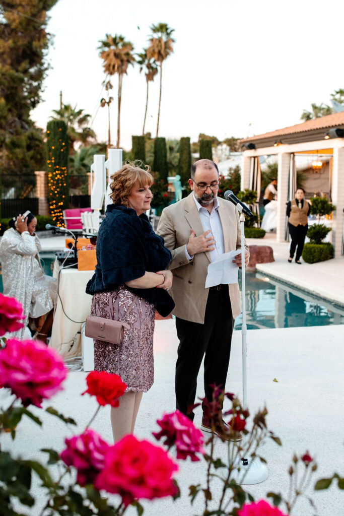 Brides mother and father giving a speech during their Mid Century Manor reception