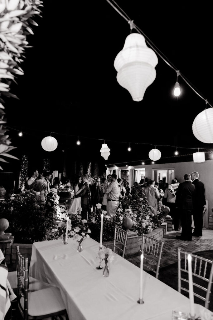 Black and white candid photo of a Mid Century Manor Las Vegas micro wedding reception