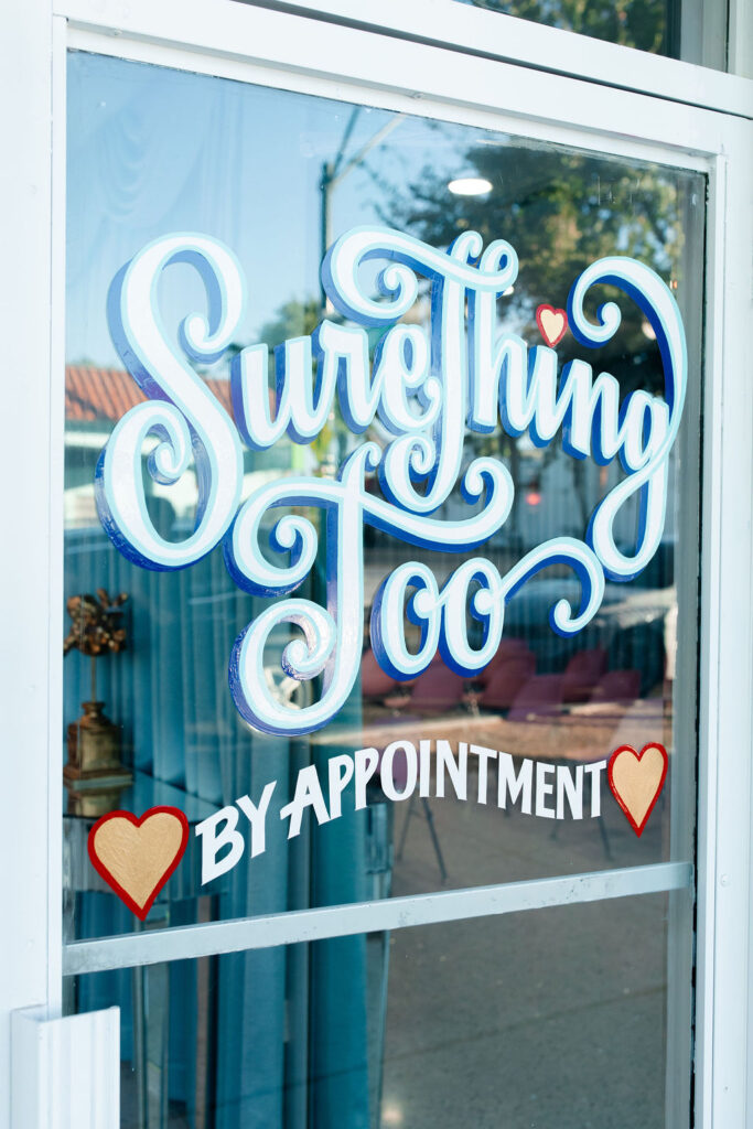 The door sign of Sure Thing Too in Las Vegas 