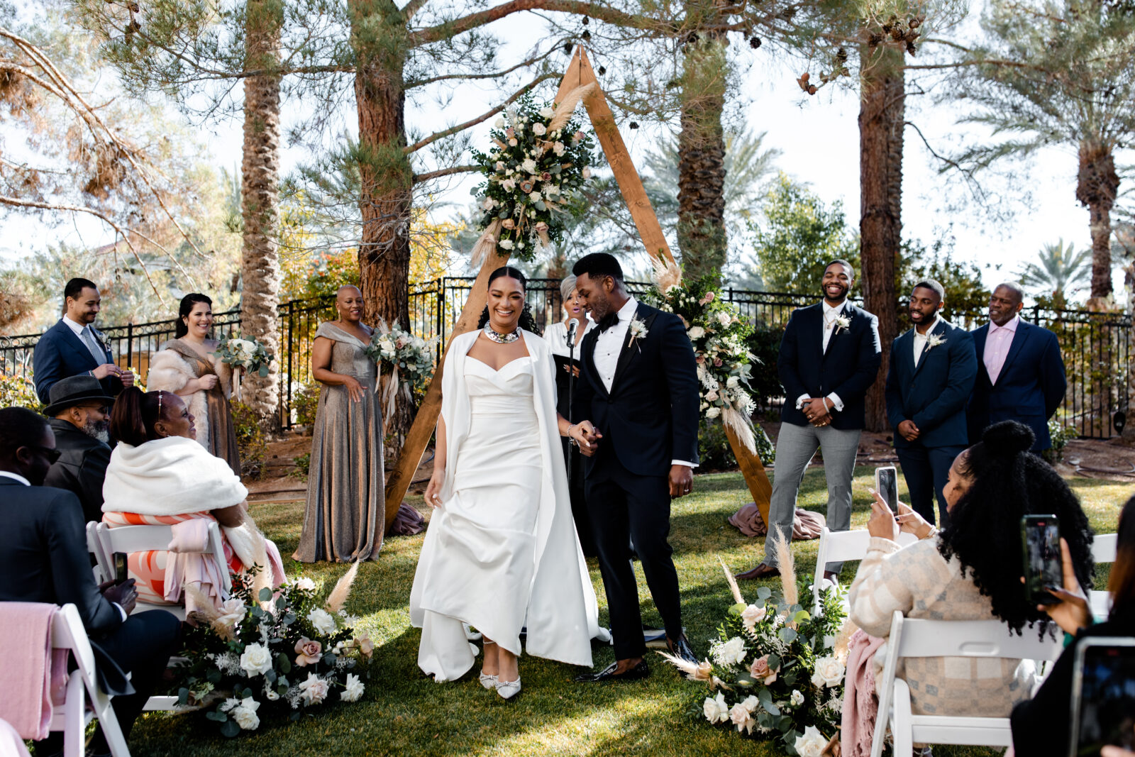 Bride and grooms outdoor winter wedding ceremony at JW Marriott Las Vegas