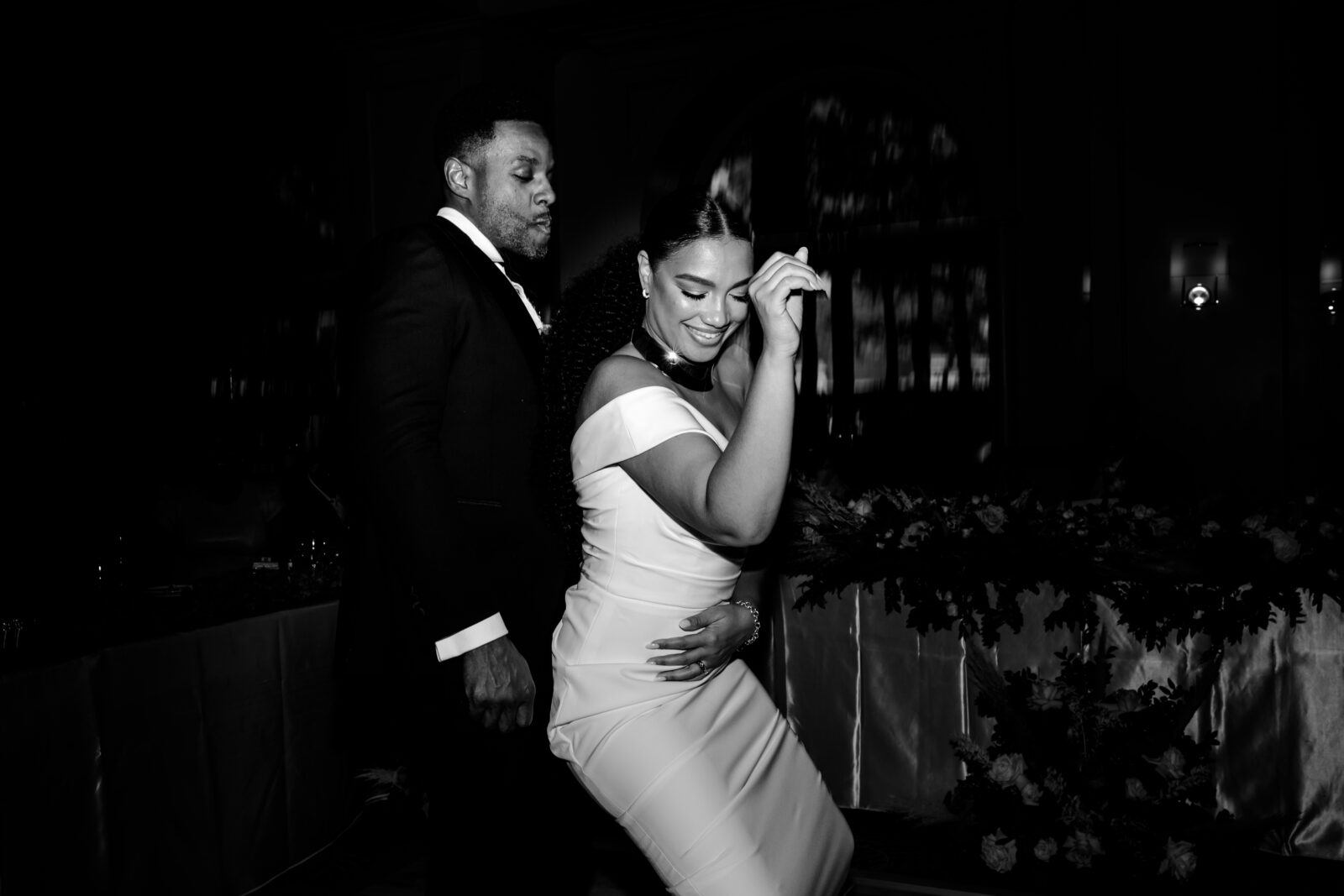 Black and white photo of a bride and groom dancing during their JW Marriott Las Vegas wedding reception