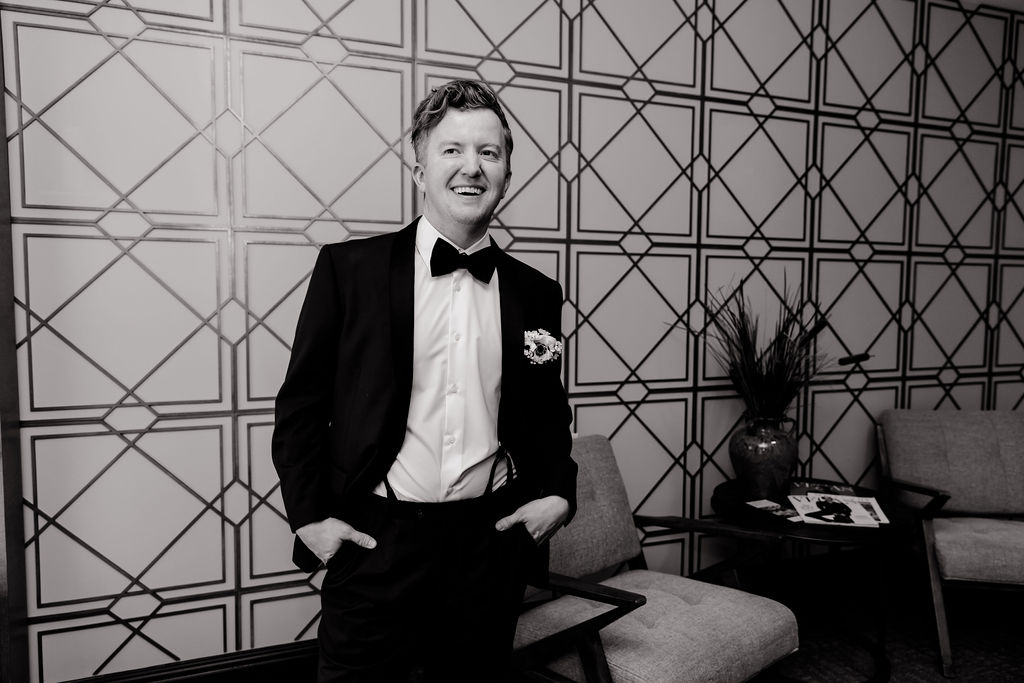 Black and white indoor grooms portraits from a JW Marriott Las Vegas wedding