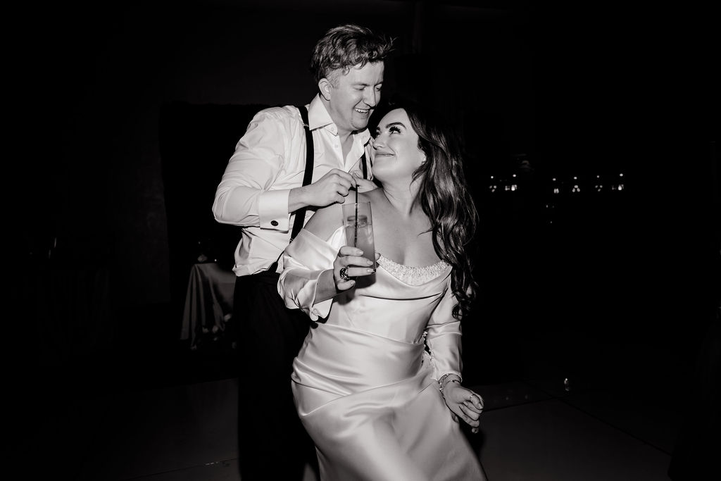 Bride and groom dancing during their wedding reception