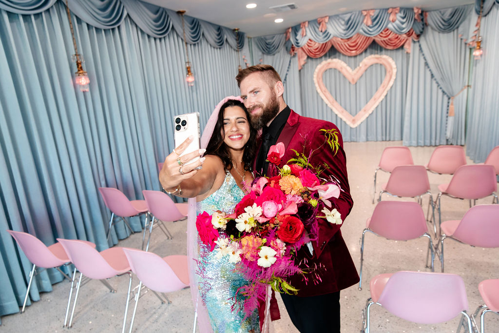 Bride and groom taking a selfie at Sure Thing Too in Las Vegas